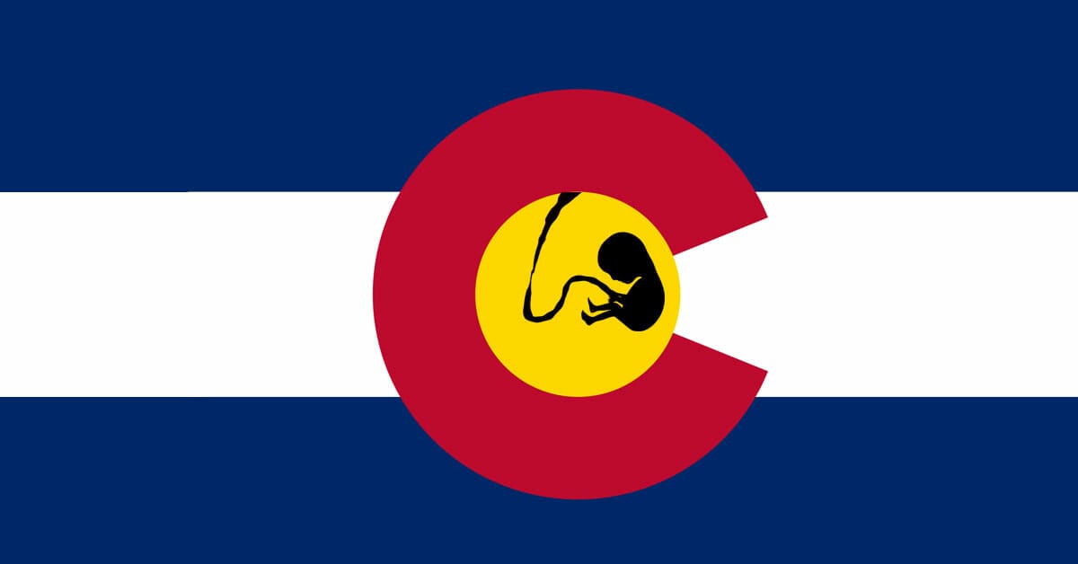 An unborn child and the Colorado State Flag used as the image for a story about Colorado's Reproductive Health Equity Act.